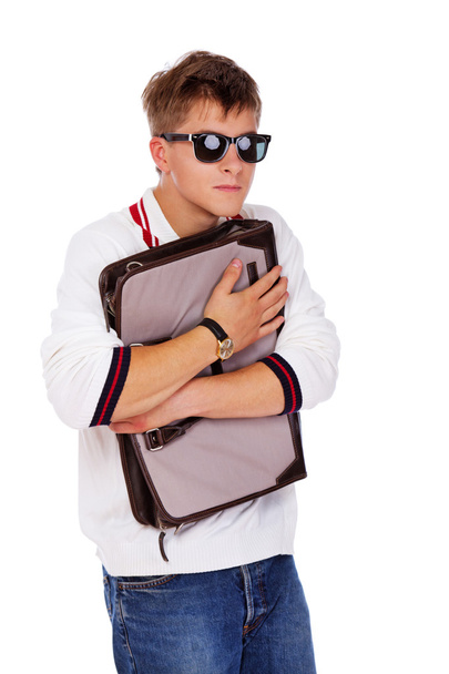 Portrait of sleazy young man posing on white background with bag - Fotó, kép
