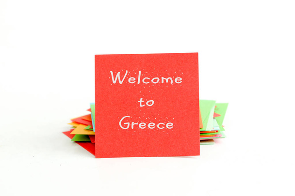 photo d'un papier de note rouge avec texte bienvenue en Grèce
 - Photo, image