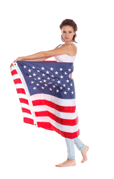 Flag of United States of America in hands of beautiful woman. Is - Foto, Imagen
