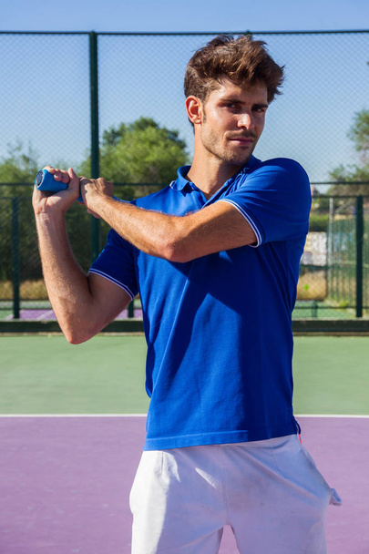 Professional tennis player is doing a kick tennis on a tennis court.  - Foto, Imagem