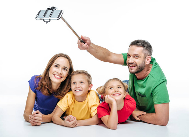 Happy family taking selfie   - Foto, Bild