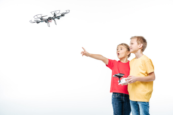 Children playing with hexacopter drone  - Foto, Bild