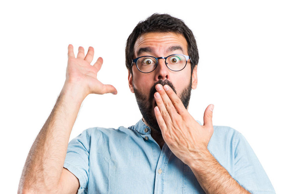 Pohledný muž dělá gesto překvapení - Fotografie, Obrázek