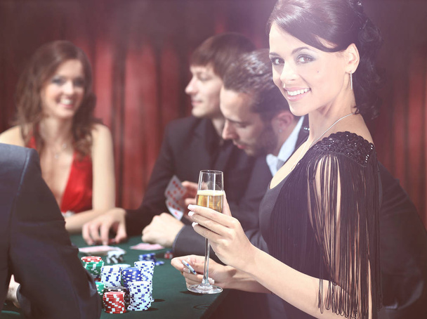 Young people have a good time in casino - Foto, Bild