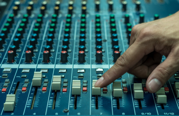  Hand adjusting audio mixer - Photo, Image