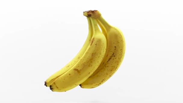 joukko banaaneja keskeytetty ilmassa
  - Materiaali, video