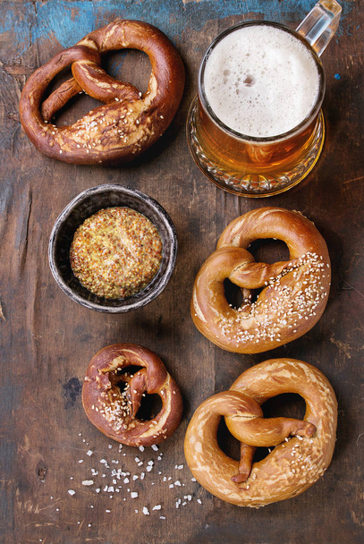 Lager beer with pretzels - Photo, image