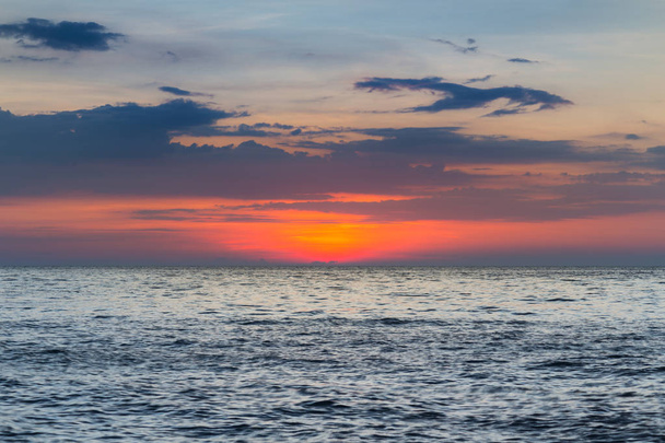 Sunset over the seacoast skyline - Foto, Imagen