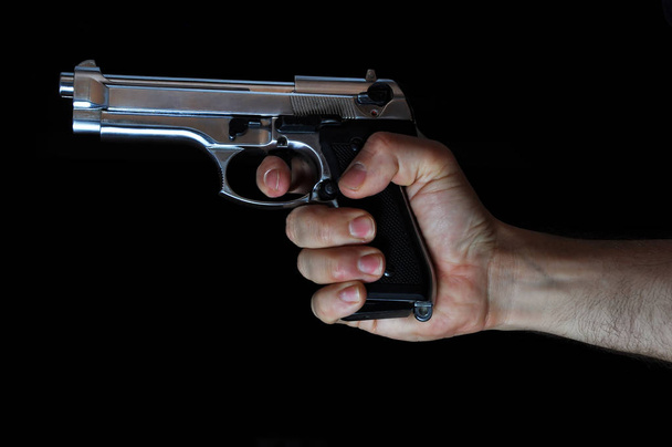 Держа пистолет
 - Фото, изображение
