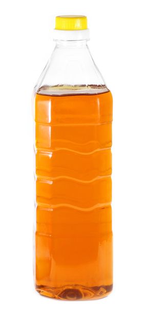 Edible mustard oil in a transparent bottle - 写真・画像