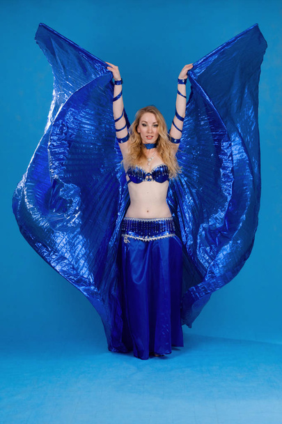 Beautiful belly dancer in motion - Photo, Image
