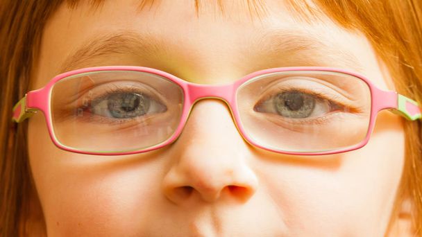 Closeup of young toddler girl in eyeglasses - 写真・画像