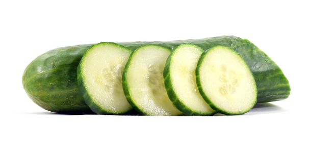 Whole English cucumber with slices - Фото, изображение