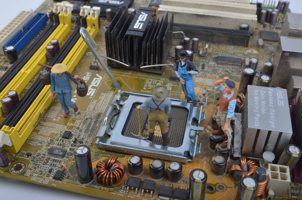 Team of engineers repairing circuit board - Photo, Image