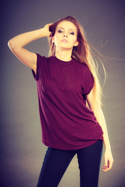 Attractive brunette woman with windblown hair - Fotografie, Obrázek