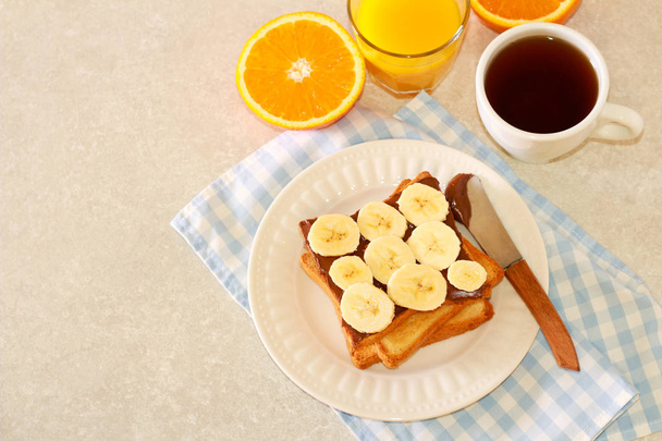 Toasts with chocolate spread  and banana - Fotografie, Obrázek