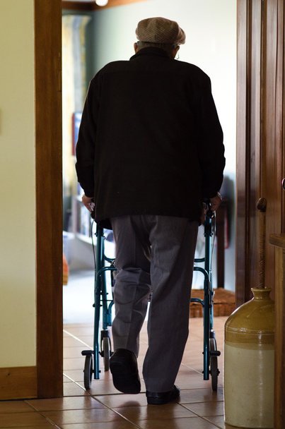 Elderly man use a walker (walking frame) - Φωτογραφία, εικόνα
