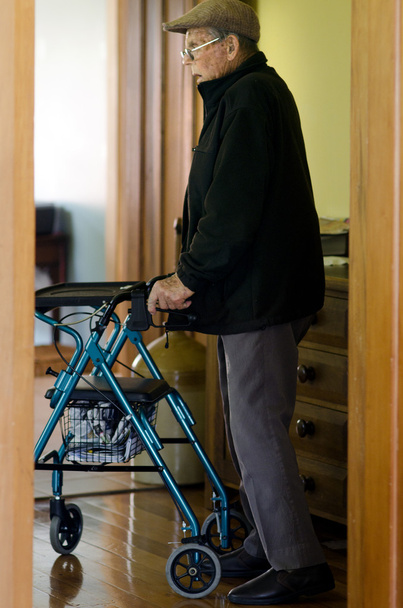 Elderly man use a walker (walking frame) - Zdjęcie, obraz