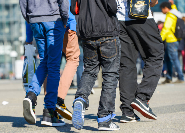 La defense, France- April 09, 2014: Group of multiethnic youth wearing brand clothes and shoes - Foto, immagini