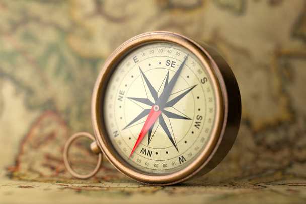 Antique Vintage Brass Compass on a Rare Map. 3d Rendering - Photo, Image