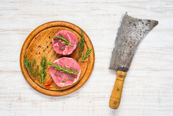 Meat Cleaver with Raw Beef in Top View - Фото, изображение