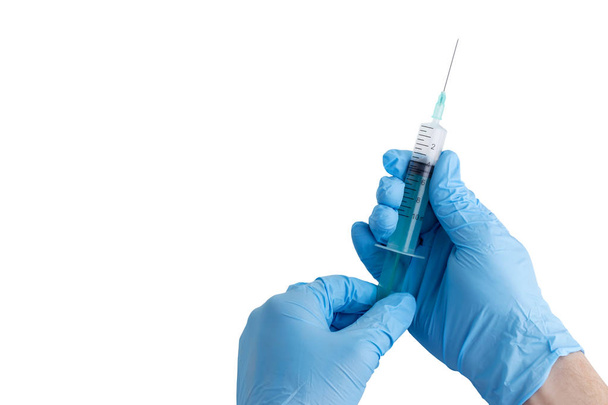 medical syringe in a hand - Foto, Imagem