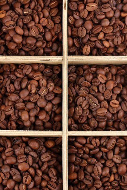Coffee beans in wooden box close-up - Фото, зображення