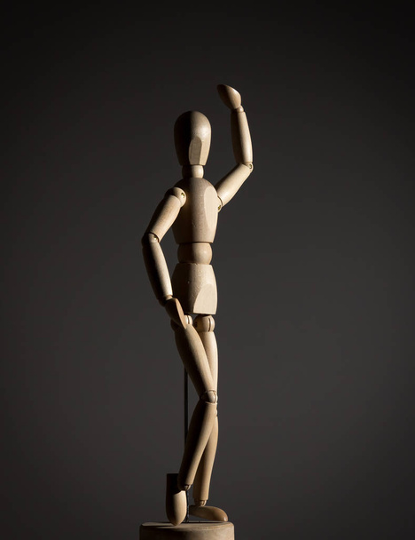 The wooden figure of a man - Фото, изображение