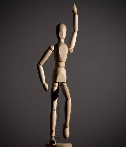 The wooden figure of a man - Foto, Bild