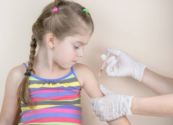vacunación infantil
 - Foto, imagen