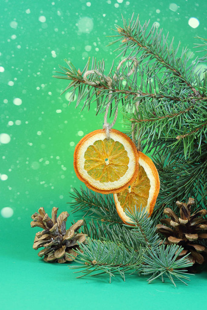 Green background for Christmas card with orange - Fotó, kép