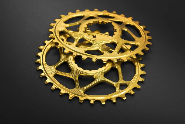 Golden bicycle oval chainring  - Photo, Image