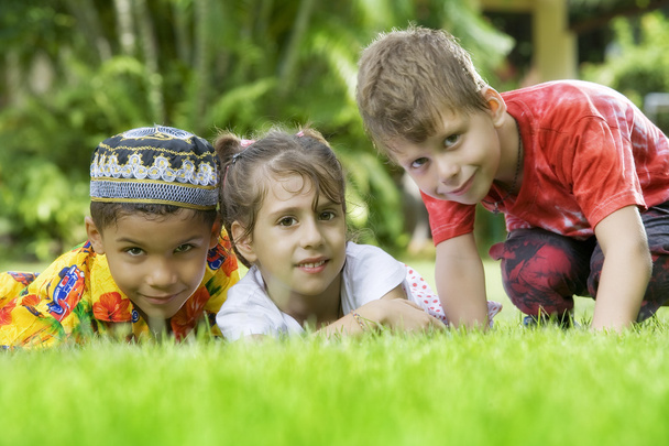 Portrait of little kids having good time in summer environment - Foto, Bild