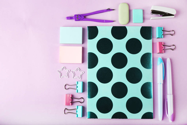 Colorful stationery on pink table - Foto, imagen
