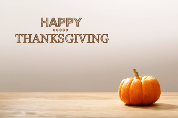 Thanksgiving message with orange pumpkin - Foto, afbeelding