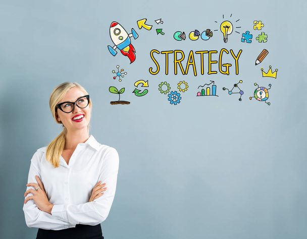 Strategy text with business woman - Фото, зображення