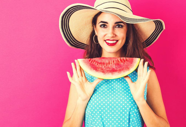 Happy young woman holding watermelon - Photo, Image
