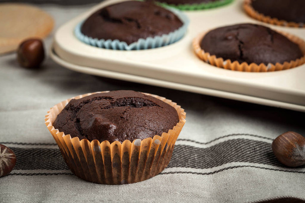 Freshly baked chocolate muffins. - Valokuva, kuva