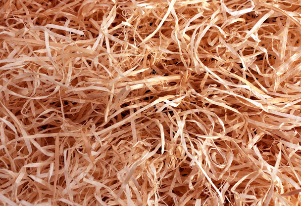 red toned wood shavings texture. - Photo, Image