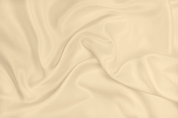 Smooth elegant golden silk or satin luxury cloth texture as wedd - Foto, Bild