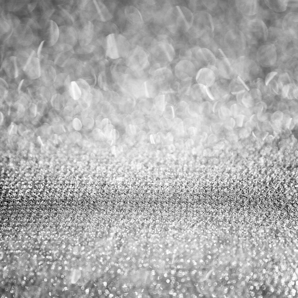 Bokeh abstracto brillante del brillo del diamante blanco de plata, espacios bonitos de la belleza del uso fácil como diseño contemporáneo del telón de fondo
 - Foto, Imagen