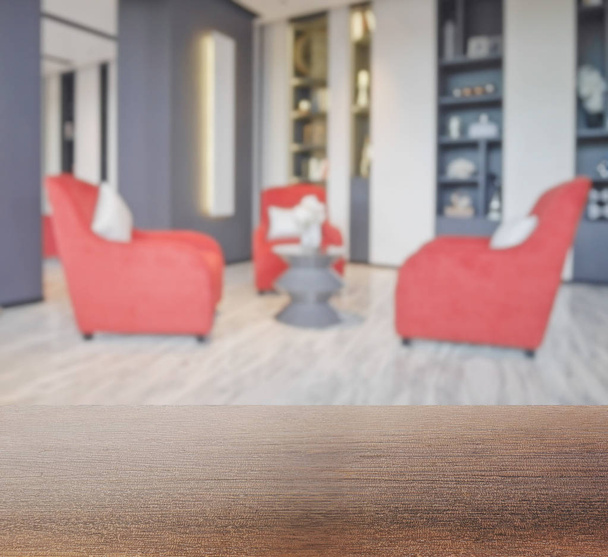 wooden table top with blur of waiting area hotel lobby - Foto, Bild