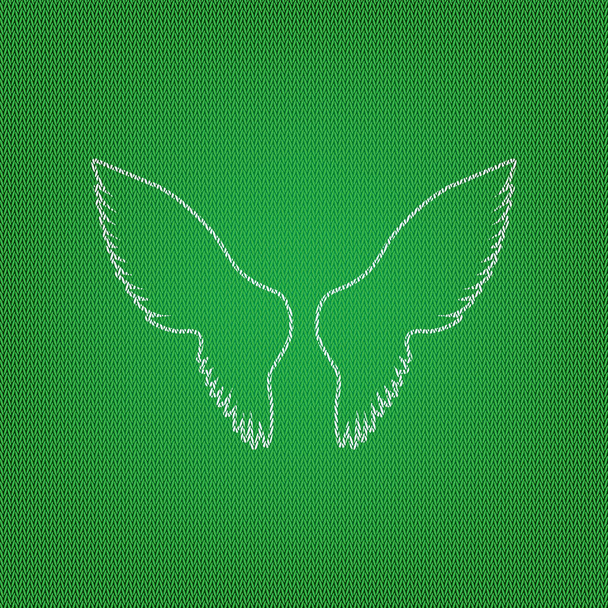 Křídla se ilustrace. bílé ikony na zelené pletené nebo woo - Vektor, obrázek