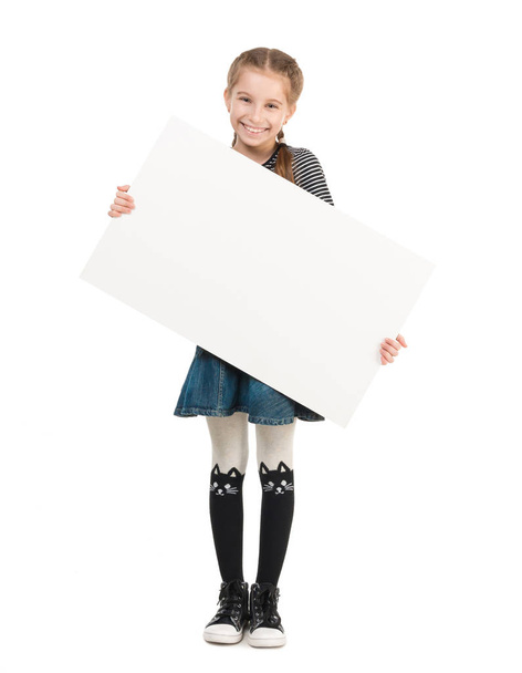 pretty schoolgirl with blank sheet in hands - Foto, Imagen