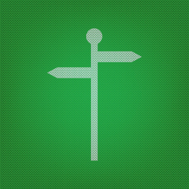 Señal de dirección. icono blanco en la prenda de punto verde o de lana
  - Vector, imagen