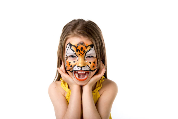 cute little girl with painted face - Foto, Bild