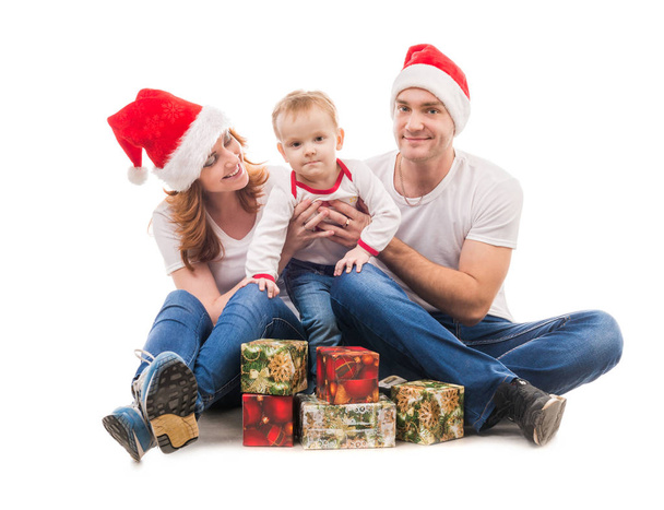 couple with little boy and presents - Фото, изображение