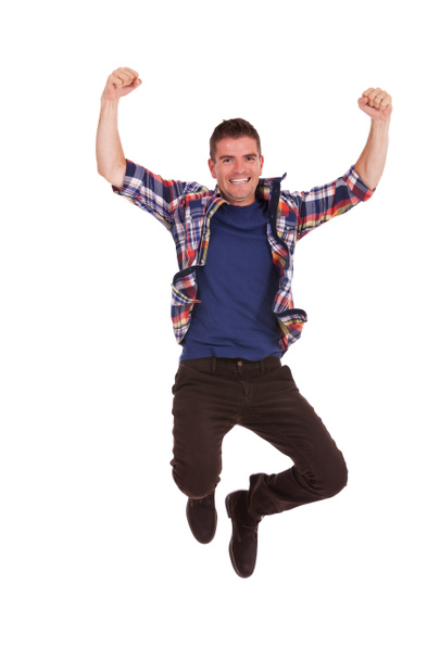 boldog fiatalember Ugrás a levegőben - Fotó, kép