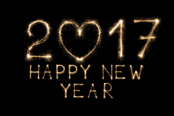 Texto de año nuevo, números más brillantes sobre fondo negro
 - Foto, imagen
