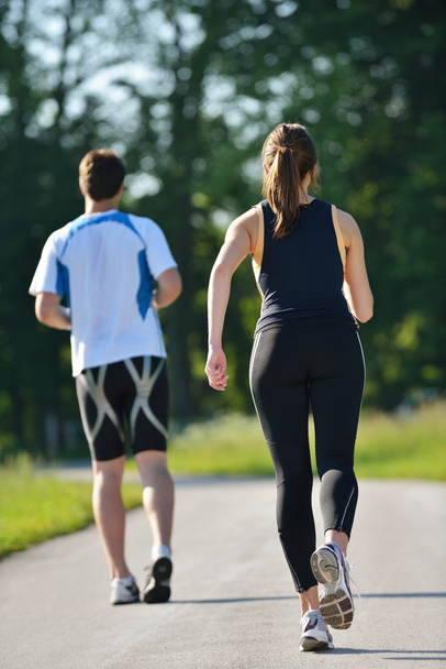 Young couple jogging at morning - Foto, Imagem